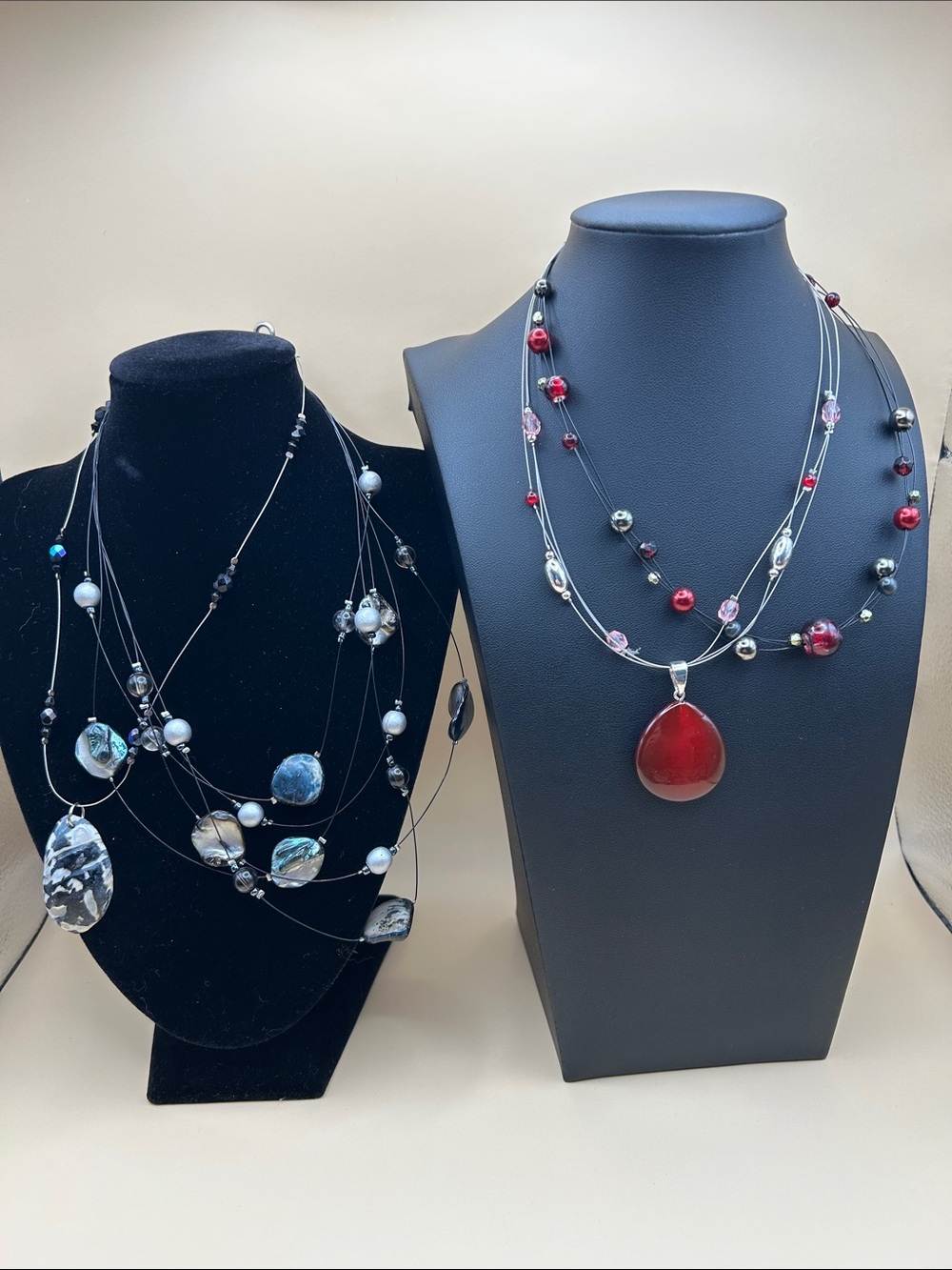 Invisible wire necklace bundle made. 4 necklaces made of shell,acrylic and other